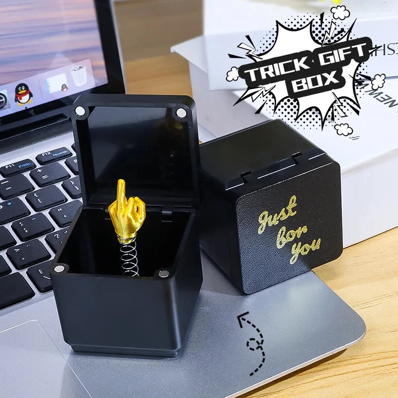 Weihnachtsgeschenk mit Mittelfinger in der Box, lustiger, kreativer Geschenkartikel, Büro- und Heimdekoration