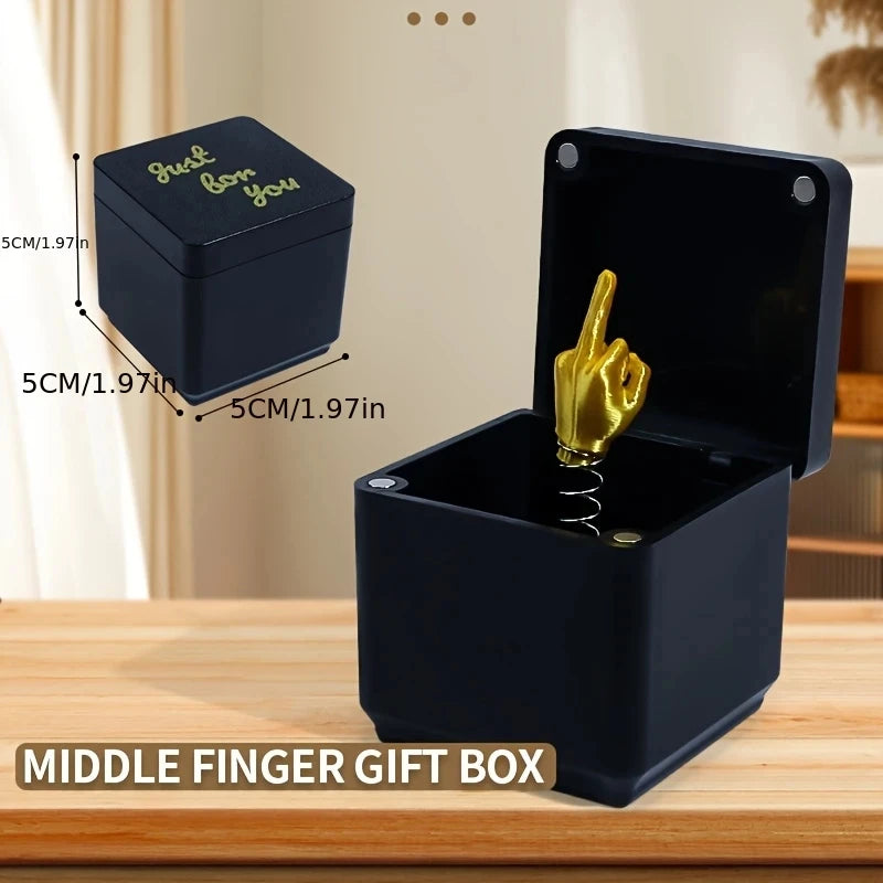 Weihnachtsgeschenk mit Mittelfinger in der Box, lustiger, kreativer Geschenkartikel, Büro- und Heimdekoration