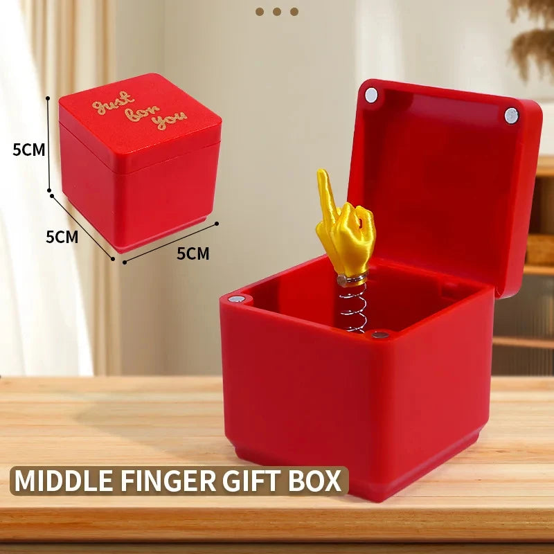 Weihnachtsgeschenk mit Mittelfinger in der Box, lustiger, kreativer Geschenkartikel, Büro- und Heimdekoration